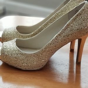 Audrey Brooke  gold lace heel never been worn
